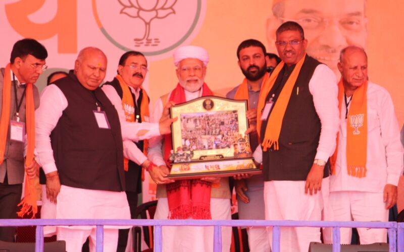 Upcoming Dhaman Gujarati movie’s producer Bhupat Bodar presents memento to PM Modi behalf of his Dhaman team 